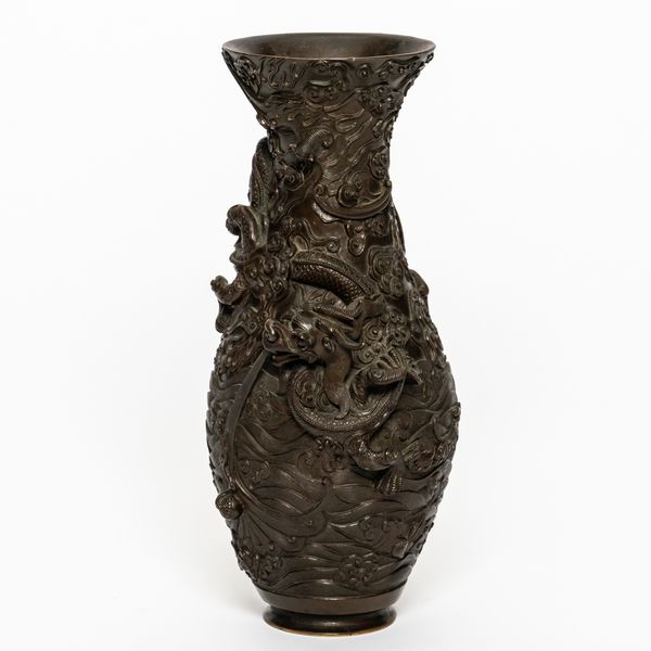 A HEAVY CHINESE BRONZE `DRAGON' SLENDER BALUSTER VASE