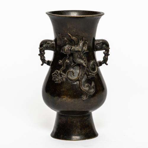 A CHINESE BRONZE TWO-HANDLED VASE