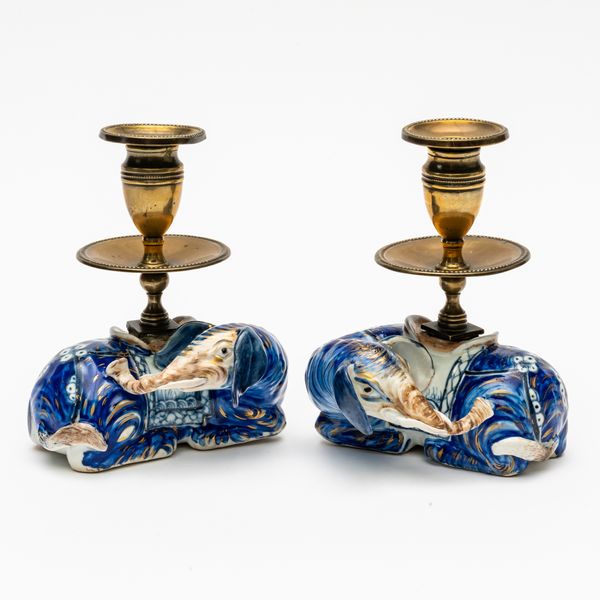 A PAIR OF CHINESE EXPORT ELEPHANT CANDLE HOLDERS (4)