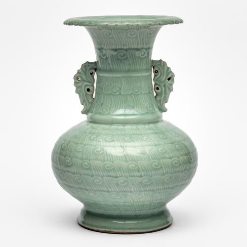 A CHINESE CELADON-GLAZE TWO-HANDLED VASE (2)