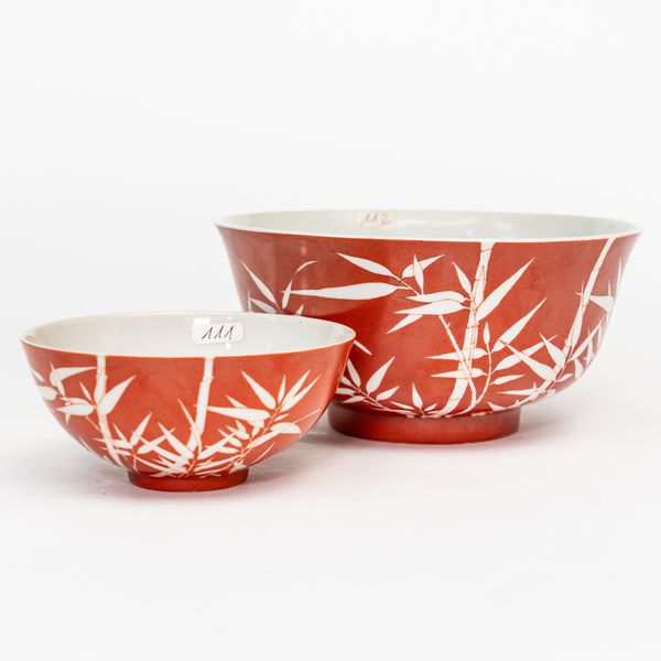 A CHINESE CORAL-GROUND RESERVE-DECORATED `BAMBOO' BOWL (2)