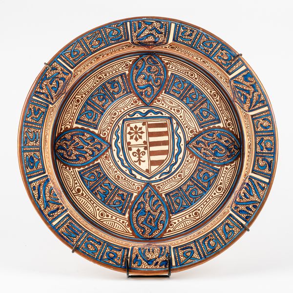 A LARGE EARTHENWARE HISPANO MORESQUE STYLE DEEP DISH