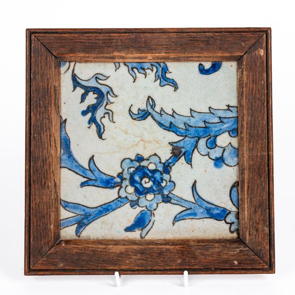 A PERSIAN POTTERY SQUARE TILE