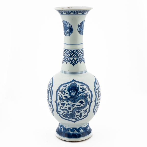 A TALL CHINESE BLUE AND WHITE DRAGON AND PHOENIX BOTTLE VASE