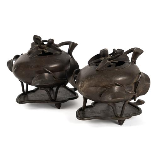 A PAIR OF CHINESE BRONZE PEACH-SHAPED CENSERS AND LEAF SHAPED STANDS (6)
