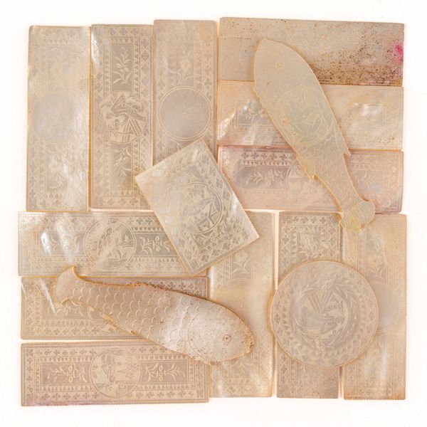 A QUANTITY OF CHINESE ENGRAVED MOTHER-OF-PEARL GAMING COUNTERS (184)