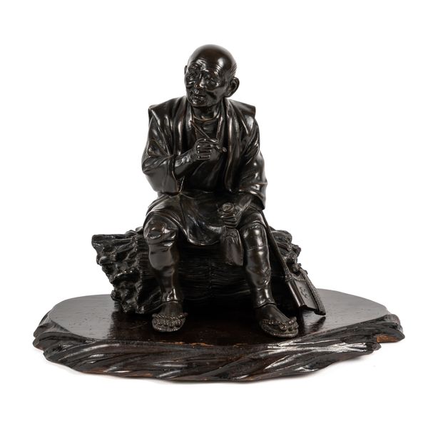A JAPANESE BRONZE FIGURE OF AN ELDERLY FARMER (2)
