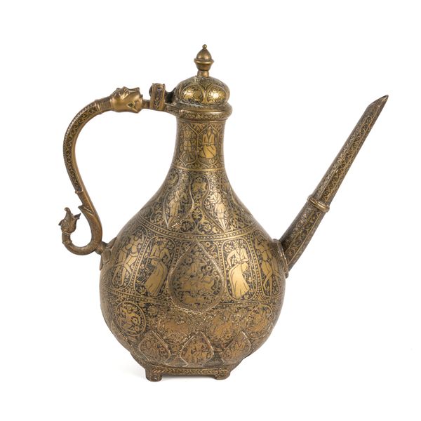 AN ENGRAVED AND LAC INLAID BRASS EWER