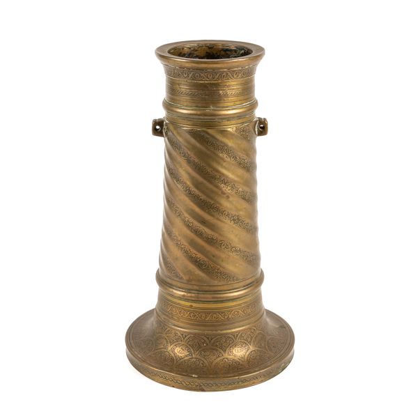 A LARGE PERSIAN BRASS CANDLESTICK