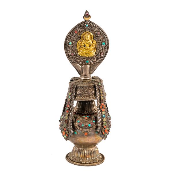 A TIBETAN PARCEL-GILT AND INLAID SILVER ALTARPIECE (2)