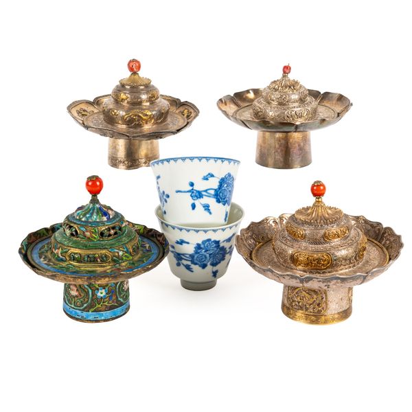 FOUR SINO-TIBETAN TEABOWL HOLDERS (10)