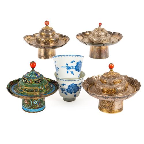 FOUR SINO-TIBETAN TEABOWL HOLDERS (10)