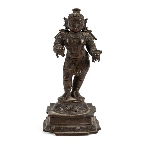 A BRONZE FIGURE OF THE INFANT KRISHNA