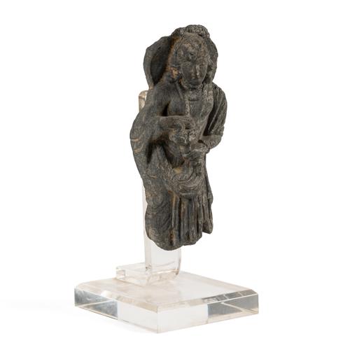A SMALL GANDHARAN GREY SCHIST TORSO OF BODHISATTVA MAITREYA