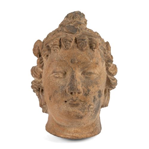 AN INDIAN GRECO-BUDDHIST GANDHARAN CARVED STONE HEAD