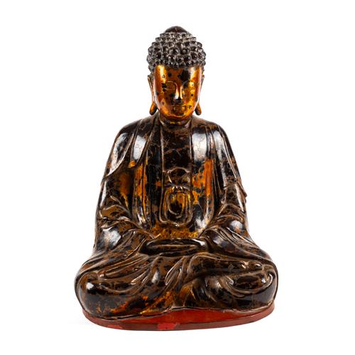 A VIETNAMESE CARVED WOOD GILT AND LACQUERED FIGURE OF GAUTAMA BUDDHA