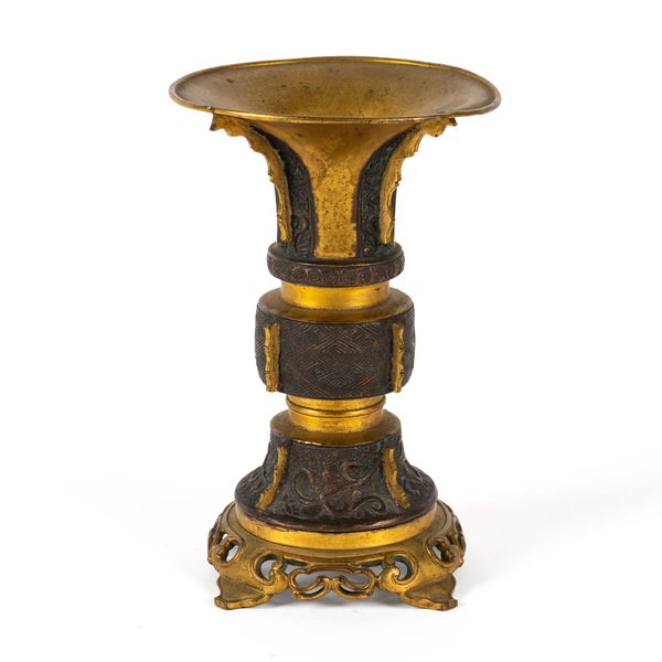 A CHINESE PARCEL GILT BRONZE GU VESSEL