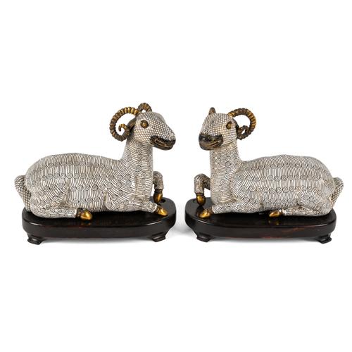 A PAIR OF CHINESE CLOISONNE RAMS (4)