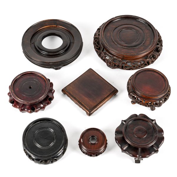 EIGHT CHINESE CARVED WOOD STANDS (8)