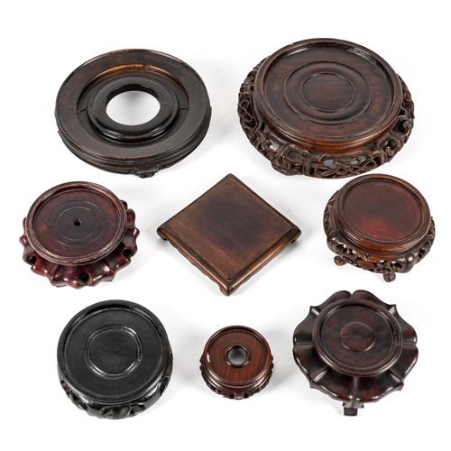 EIGHT CHINESE CARVED WOOD STANDS (8)