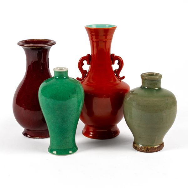 A CHINESE MONOCHROME ORANGE GLAZED PORCELAIN TWO-HANDLED VASE (4)