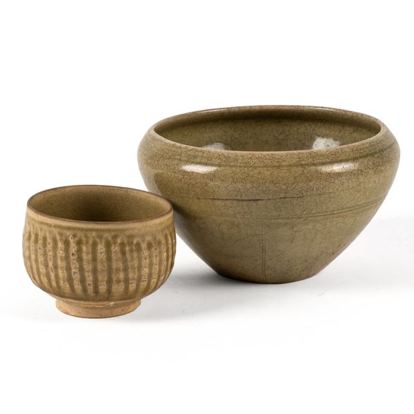 AN EAST ASIAN CARVED STONEWARE CELADON BOWL (2)