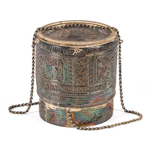 A THAI OR BURMESE SILVER-COLOURED METAL CYCLINDRICAL CONTAINER (2)