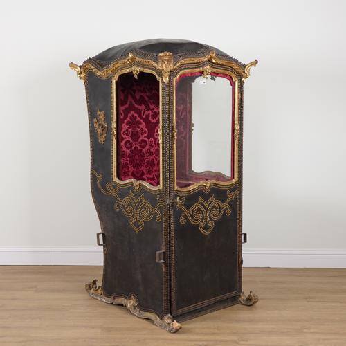 A VENETIAN STUDDED LEATHER AND PARCEL GILT SEDAN CHAIR
