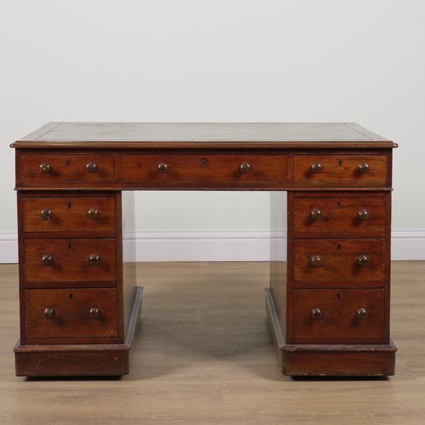 A 19TH CENTURY MAHOGANY NINE DRAWER PEDESTAL DESK