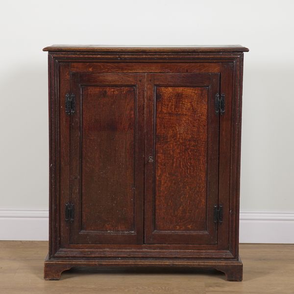 A MID 18TH CENTURY OAK FLOOR STANDING TWO DOOR CUPBOARD