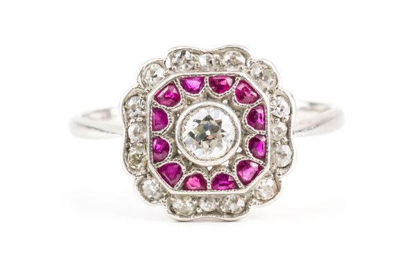 A PLATINUM, RUBY AND DIAMOND RING