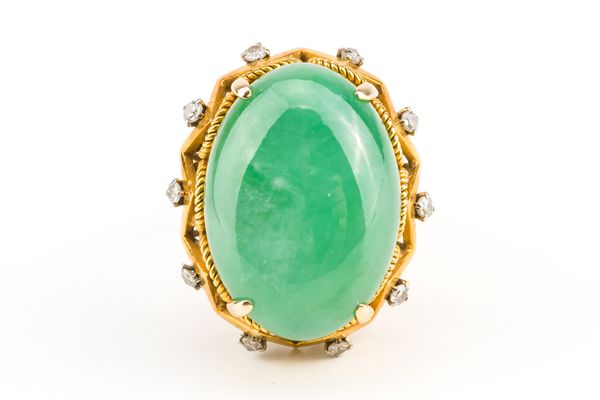 A GOLD, JADE AND DIAMOND RING