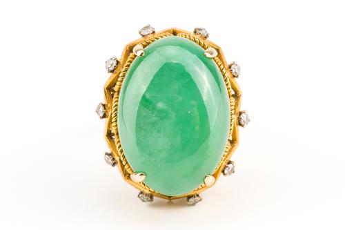 A GOLD, JADE AND DIAMOND RING