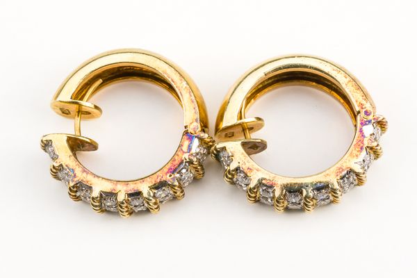 A PAIR OF GOLD AND DIAMOND HOOP SHAPED EARRINGS