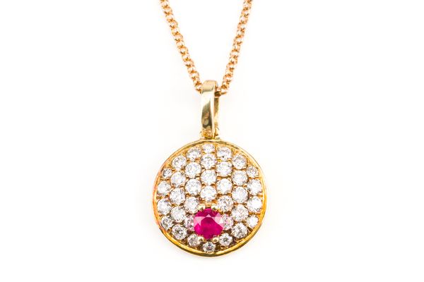 A 9CT GOLD RUBY AND DIAMOND PENDANT WITH A 9CT GOLD NECKCHAIN