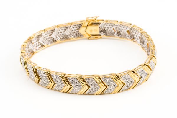 A GOLD AND DIAMOND BRACELET