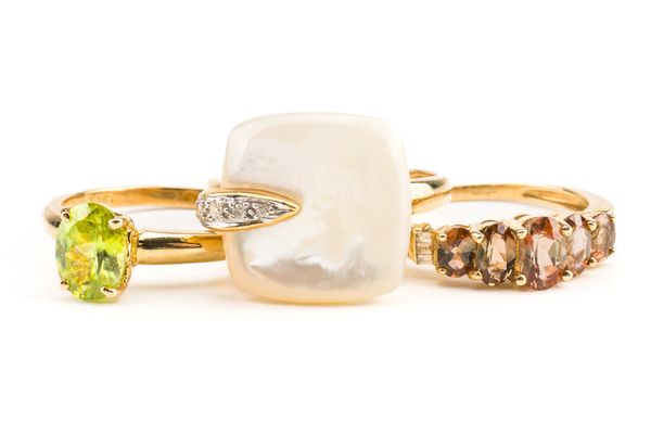 A 9CT GOLD, MOTHER-OF-PEARL AND DIAMOND RING AND TWO FURTHER RINGS (3)