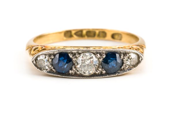 AN 18CT GOLD SAPPHIRE AND DIAMOND FIVE STONE RING