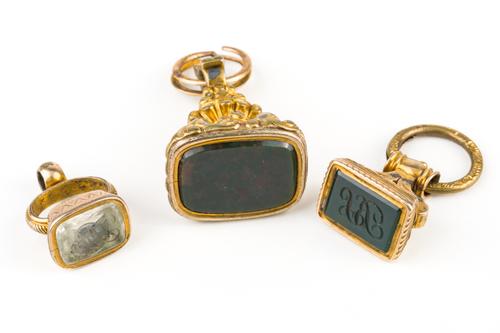 THREE PENDANT FOB SEALS (3)