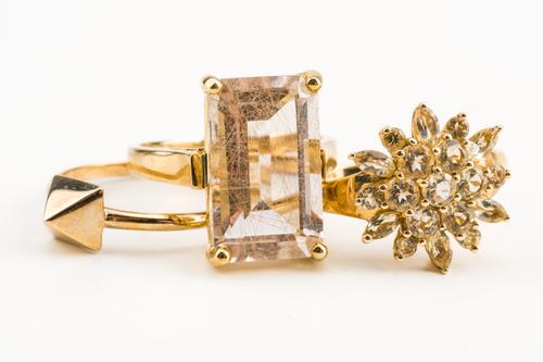 A 9CT GOLD RING AND TWO FURTHER RINGS (3)