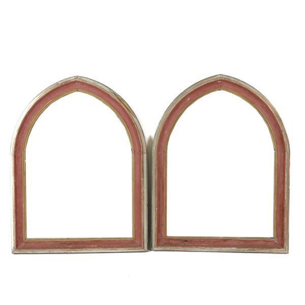 A PAIR OF GOTHIC STYLE RED PAINTED ARCHED TOP WALL MIRRORS (2)