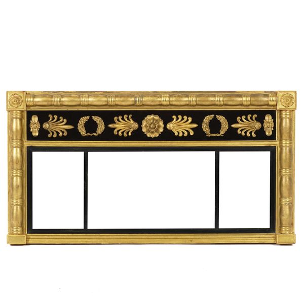 A REGENCY GILT FRAMED AND EBONISED TRIPLE PLATE OVERMANTEL MIRROR