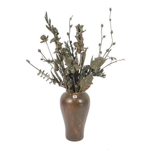 RHONDA ROLAND SHEARER (AMERICAN, B.1954): A BRONZE STILL LIFE OF FLOWERS IN A VASE