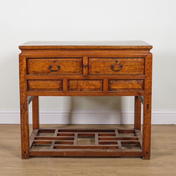 AN EARLY 20TH CENTURY CHINESE EXPORT CAMPHOR WOOD TWO DRAWER SIDE TABLE