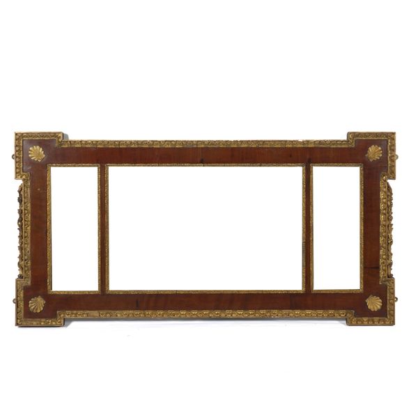 A REGENCY STYLE PARCEL GILT MAHOGANY TRIPLE PLATE OVERMANTEL MIRROR