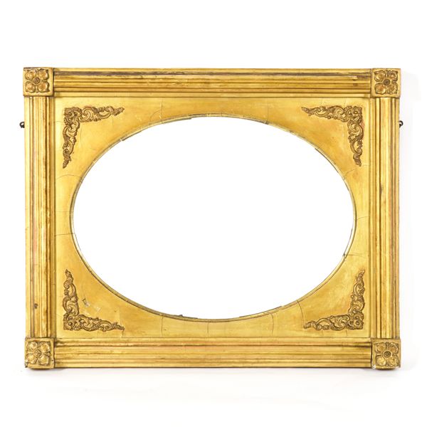 A LATE 19TH CENTURY GILT FRAMED MIRROR