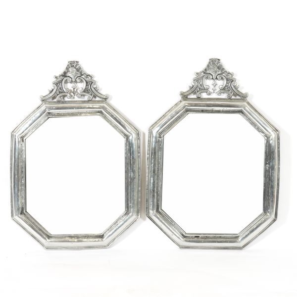 A PAIR OF PEWTER FRAMED HEXAGONAL WALL MIRRORS (2)