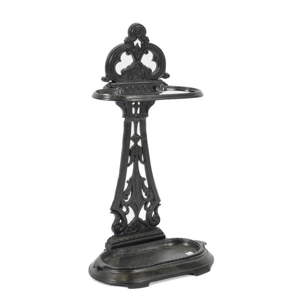 A LATE VICTORIAN CAST IRON AND LATER BLACK PAINTED STICK STAND