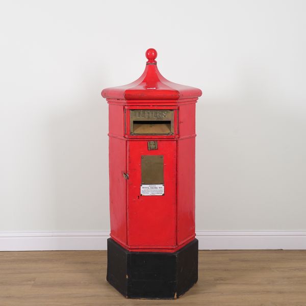 A BRASS MOUNTED RED AND BLACK PAINTED METAL ONION TOP POST BOX