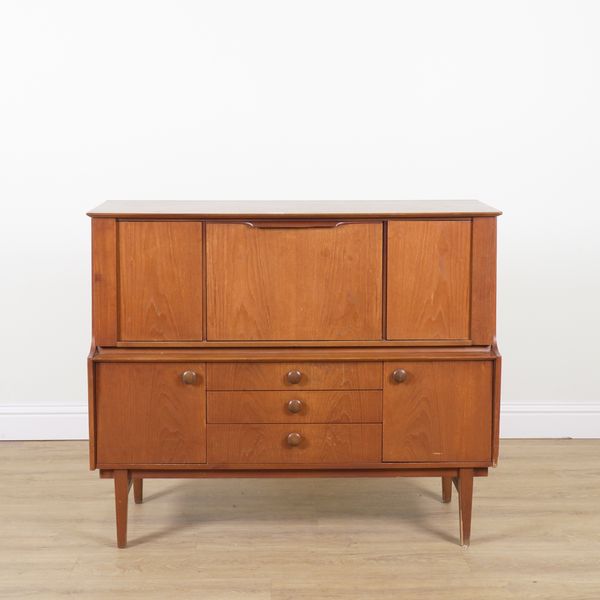 PROBABLY G-PLAN; A MID 20TH CENTURY TEAK COCKTAIL CABINET